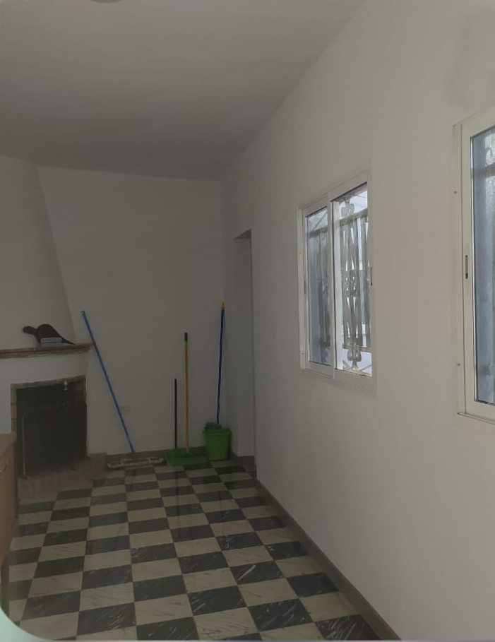 Reforma de un Pasillo. Mejora de la apariencia 6 Reforma de un Pasillo. La finalización de una visión: un pasillo residencial cobra vida con colores claros y diseño atemporal.
